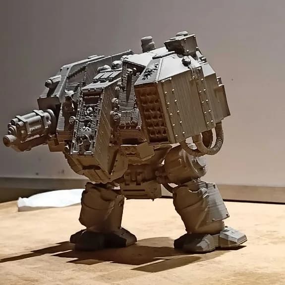 Right side of the printed Dreadnought figure with the riveted weapon pod and hydraulic hoses