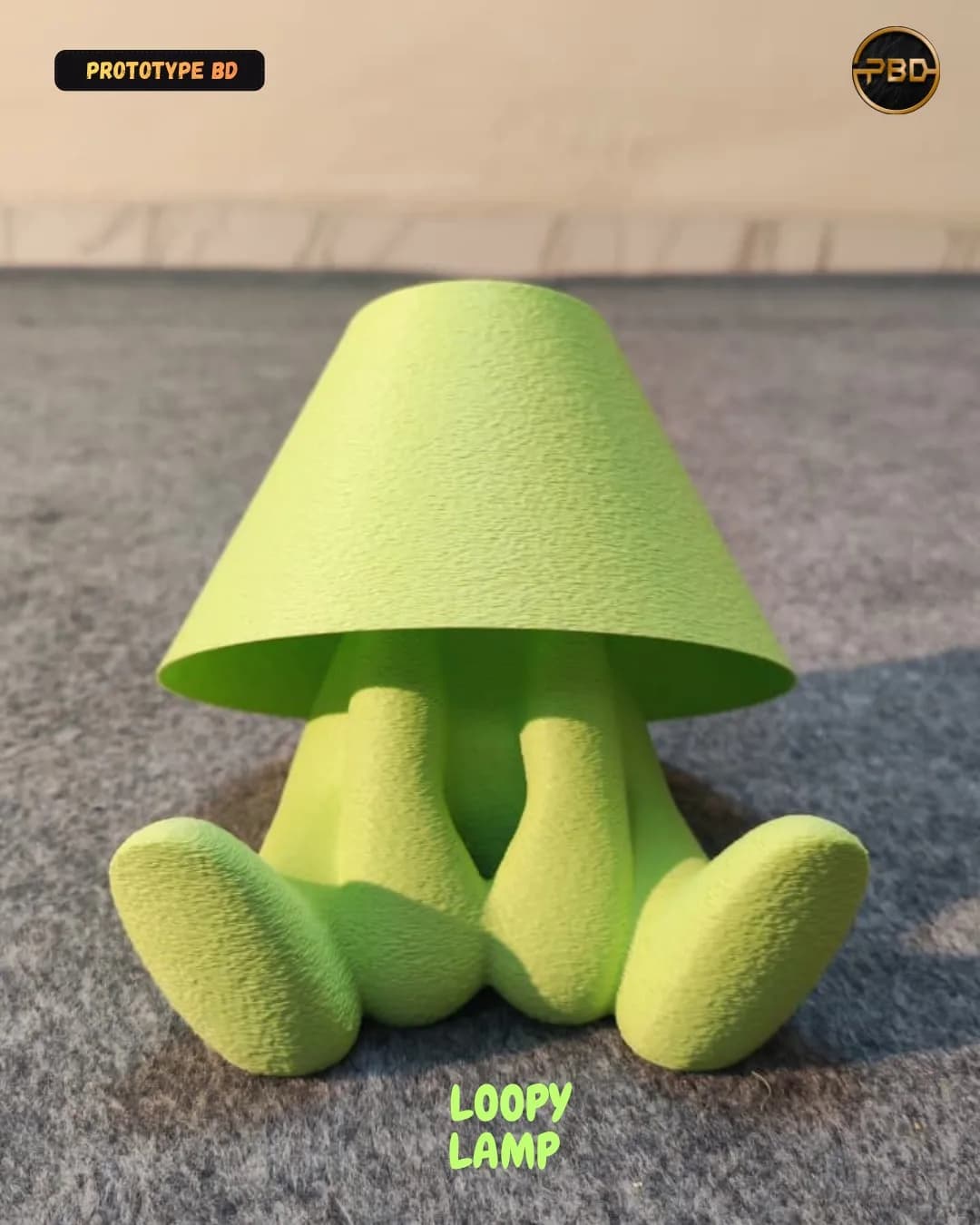 Lime green Loopy Lamp, a seated figure with its legs stretched out under a conical shade